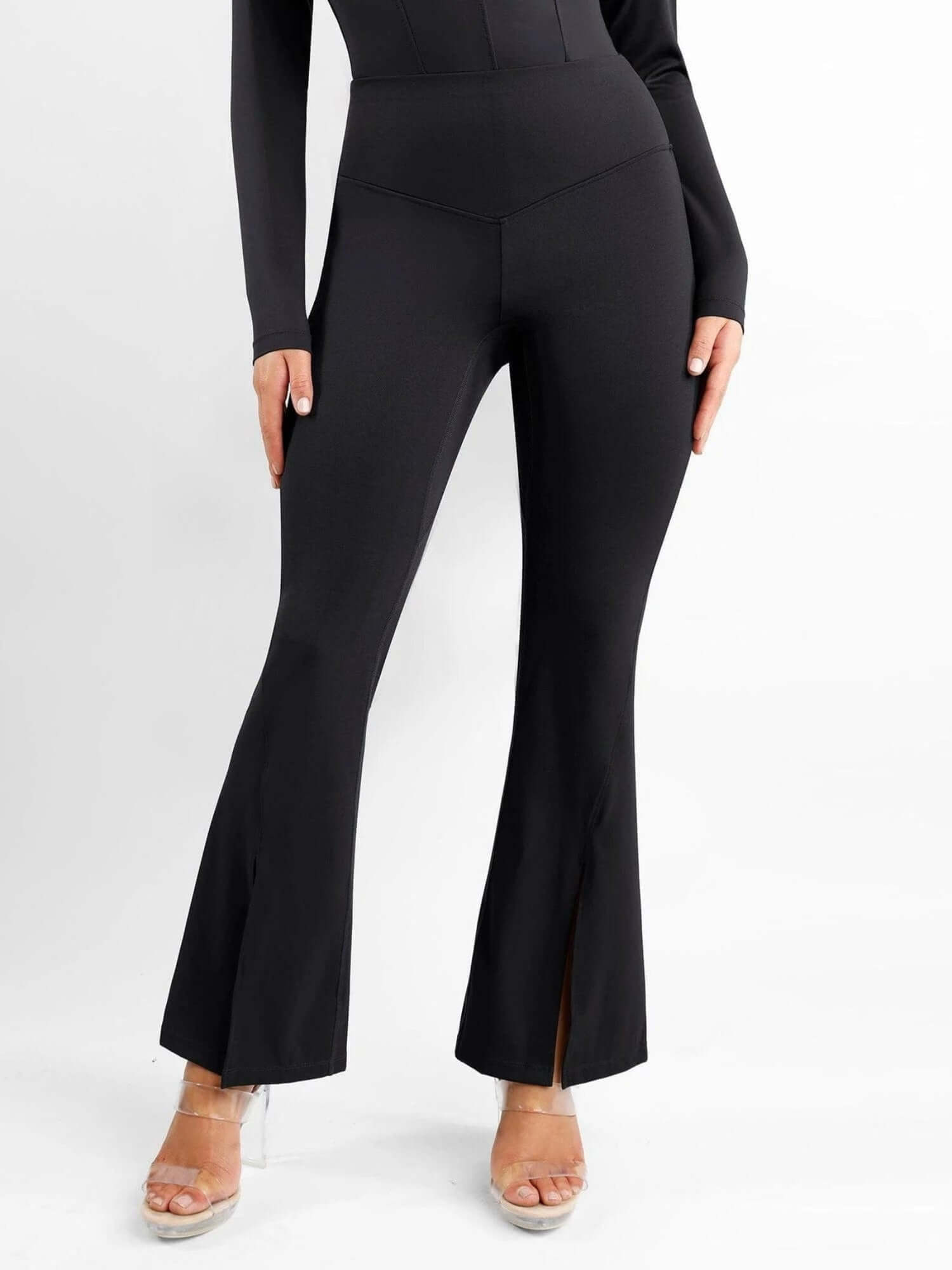 High-waisted front slit leggings in black with micro-flare fit, slimming silhouette, and stylish leg-elongating front slits