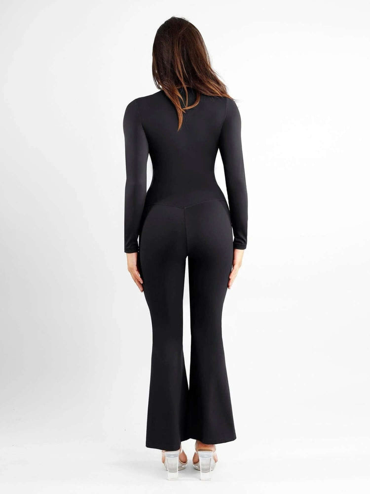 high-waisted front slit leggings in black, back view, slim fit activewear with flattering flared leg and body-shaping waist