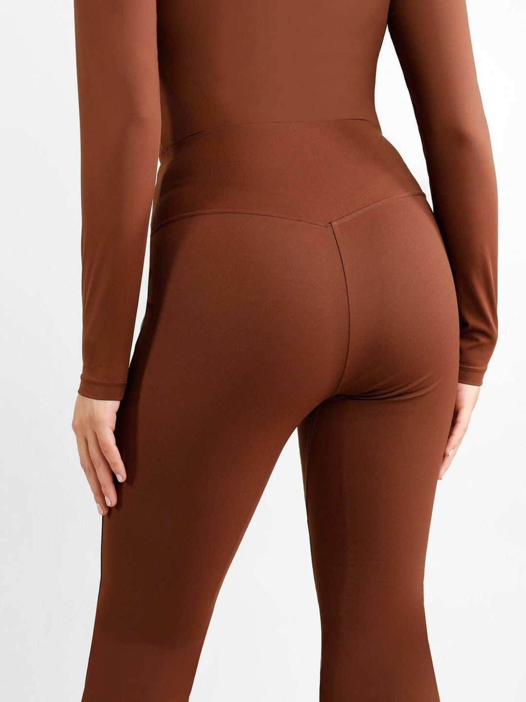 high-waisted front slit leggings in brown, back view with slimming fit and body-shaping mesh for workout comfort