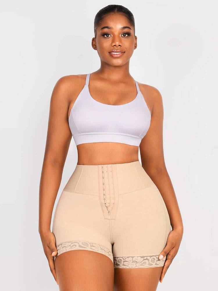high-waisted shaping shorts with center-seam-free design, tummy smoothing support, and mid-thigh coverage on model