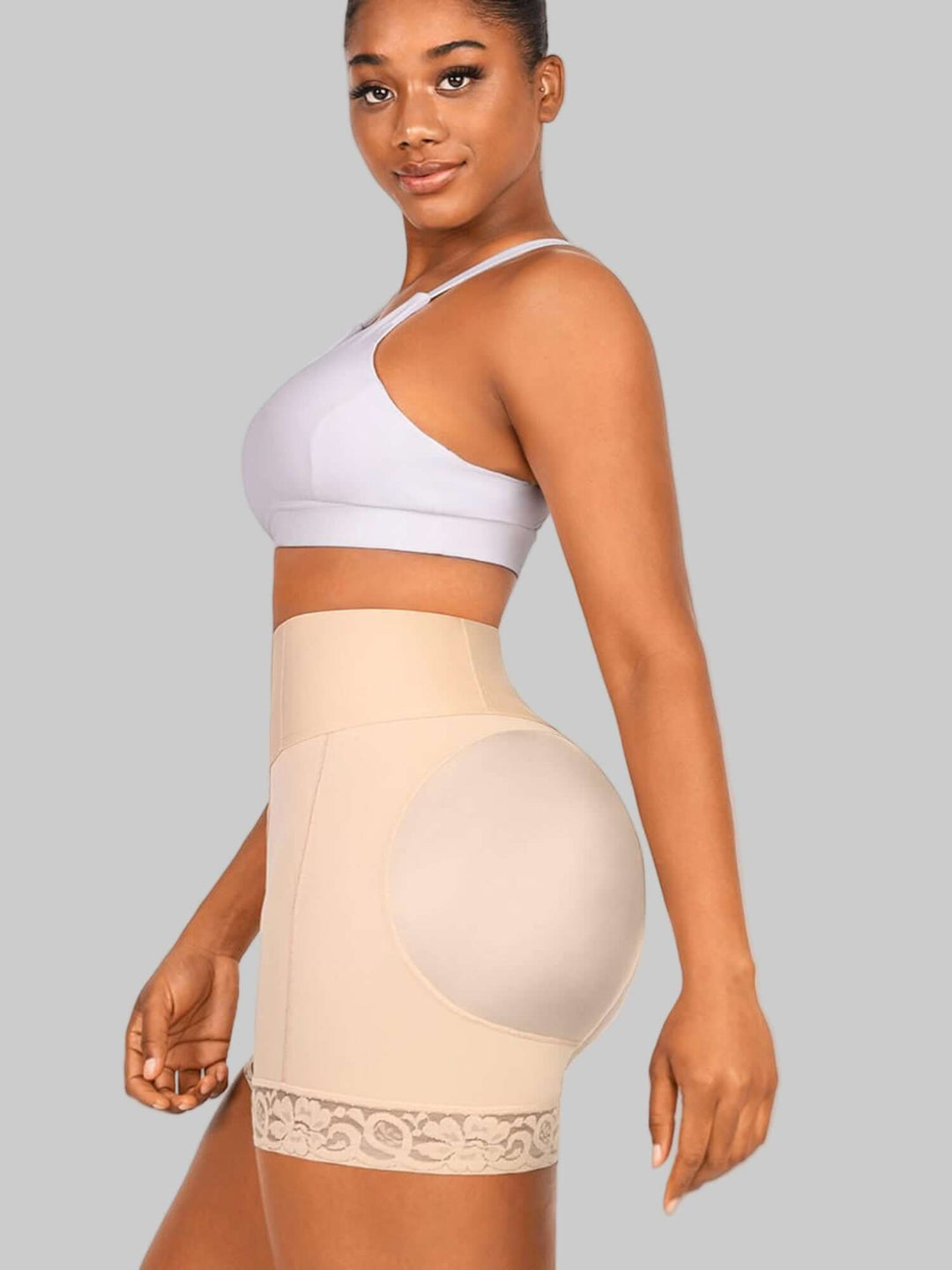 high-waisted shaping shorts with tummy control and smoothing support for a flattering mid-thigh fit