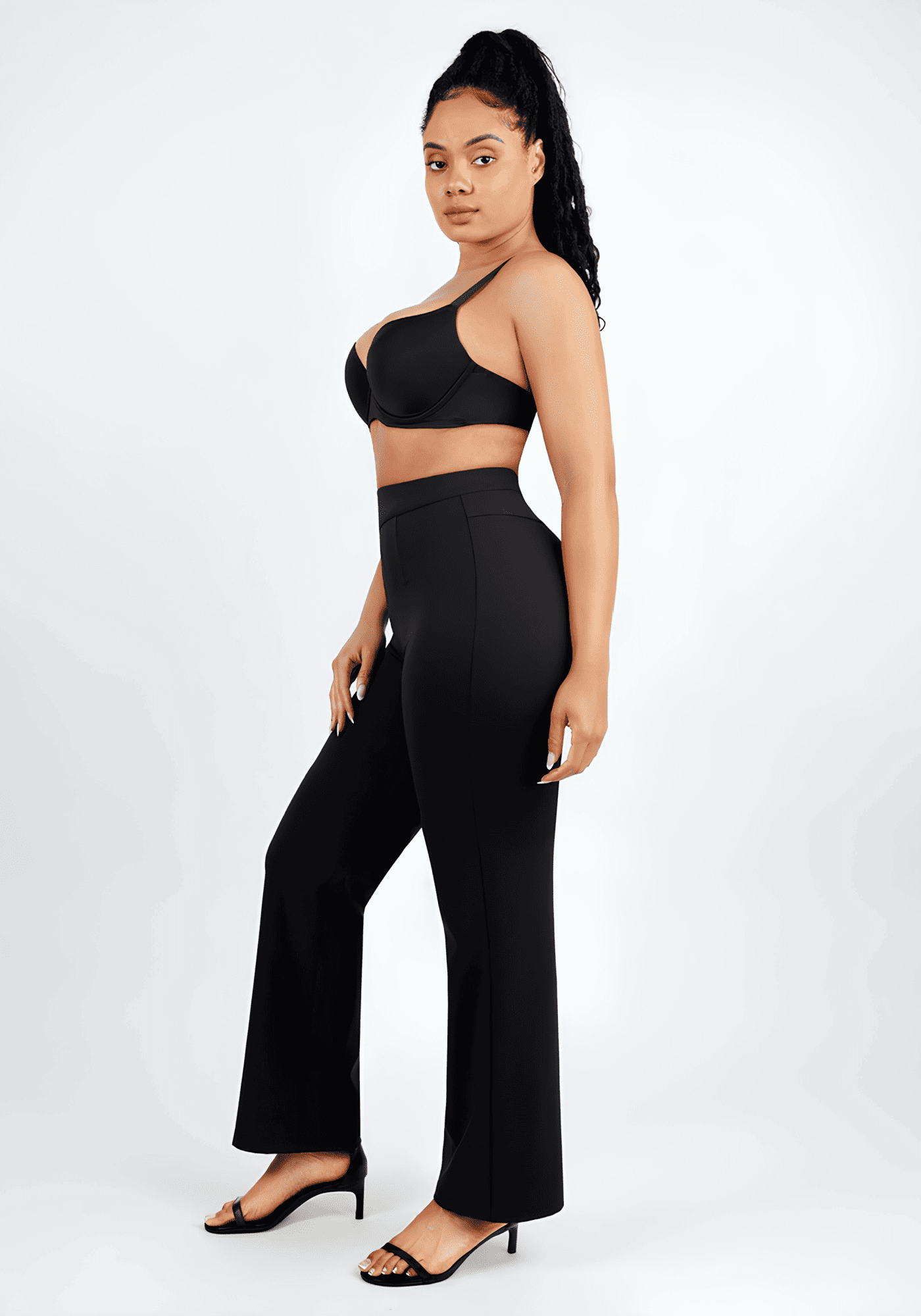 high-waisted straight leg pants in black with sculpting fit and wide waistband for a polished, streamlined look