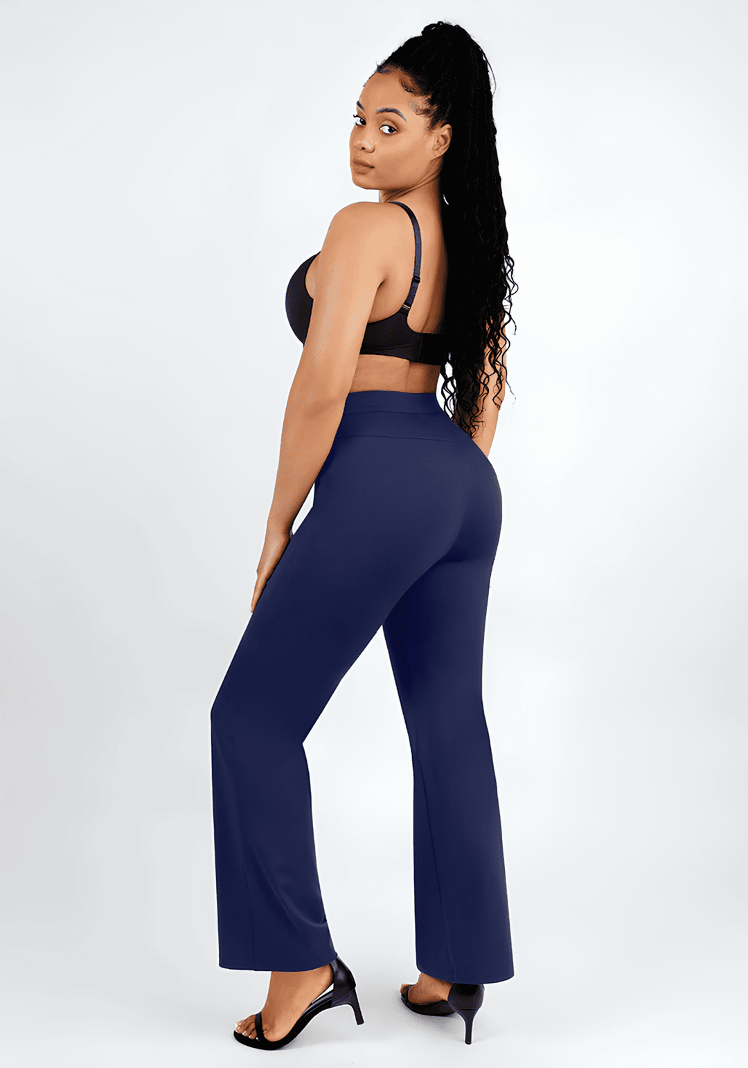 high-waisted straight leg pants in navy sculpting Roman fabric with built-in shaping shorts, worn by model