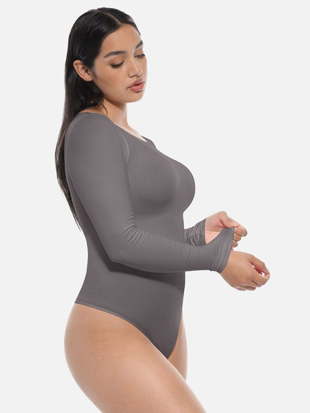 long sleeve body shaper with light tummy control, crew neck, and breathable stretch fabric for a smooth flattering fit