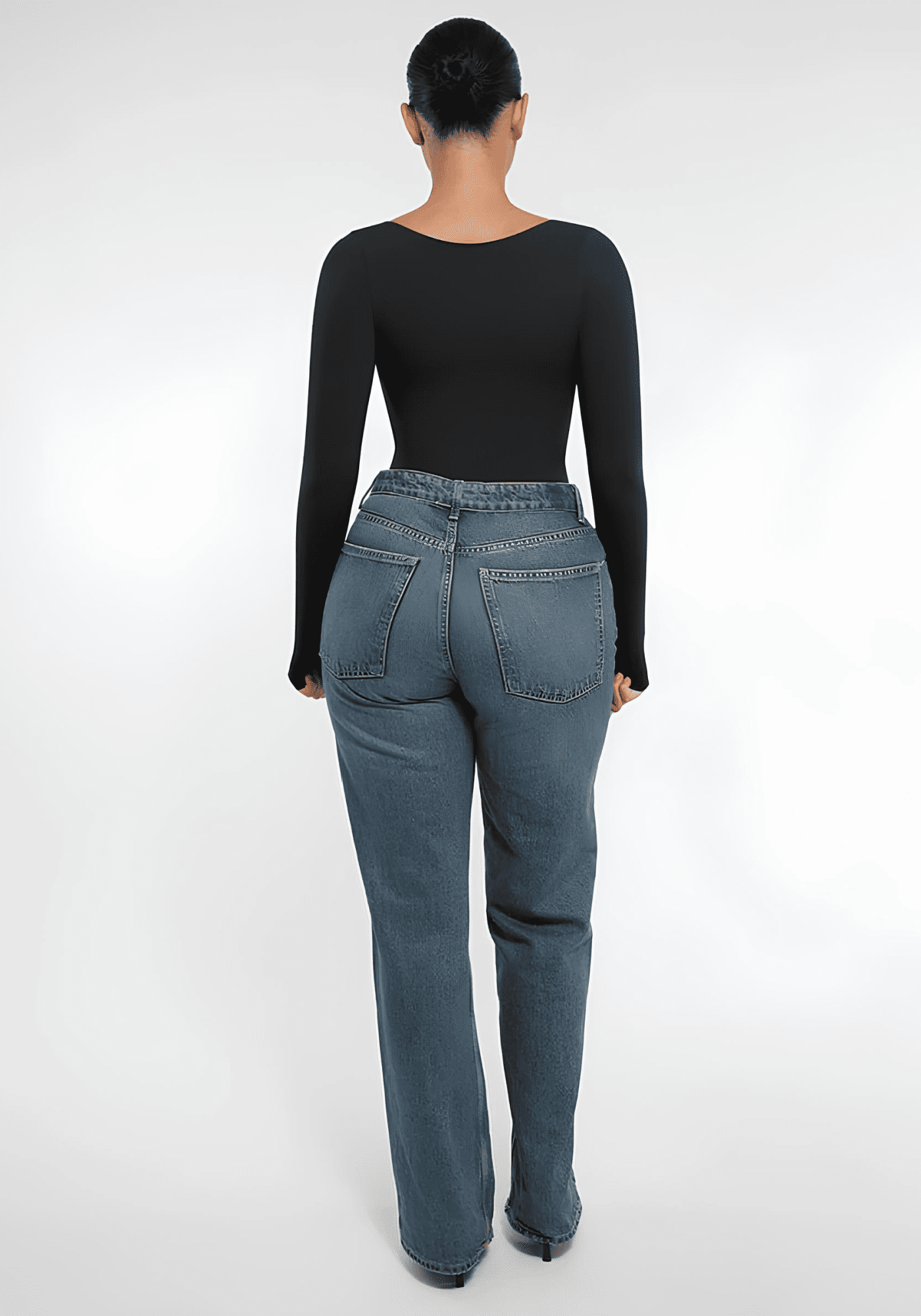 long sleeve sculpting bodysuit with seamless long-sleeve fit, smooth shaping support, and a sleek layered look