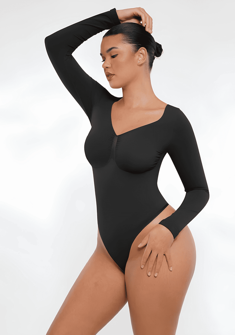 long sleeve sculpting bodysuit with seamless shaping support and smooth black finish for everyday layering