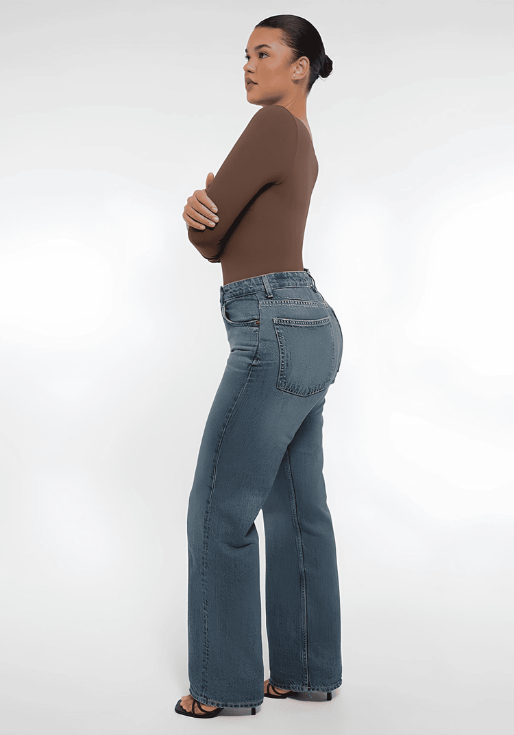 long sleeve sculpting bodysuit worn with jeans for a smooth, streamlined fit and everyday layering