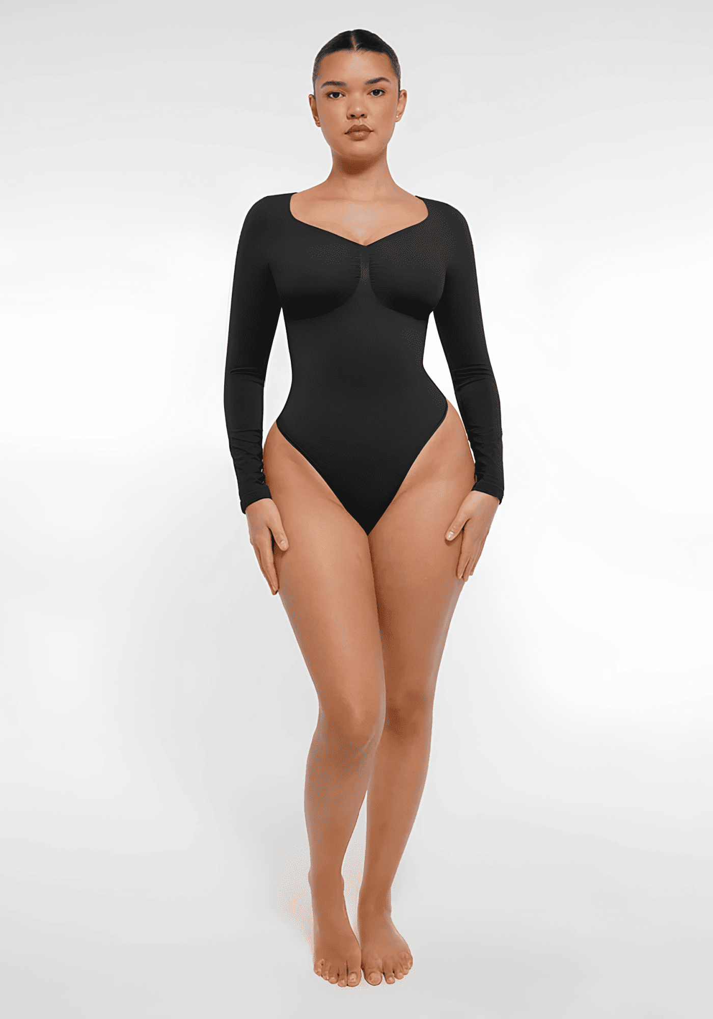 long sleeve sculpting bodysuit with seamless long sleeves, sculpting fit, and smooth second-skin finish for layering