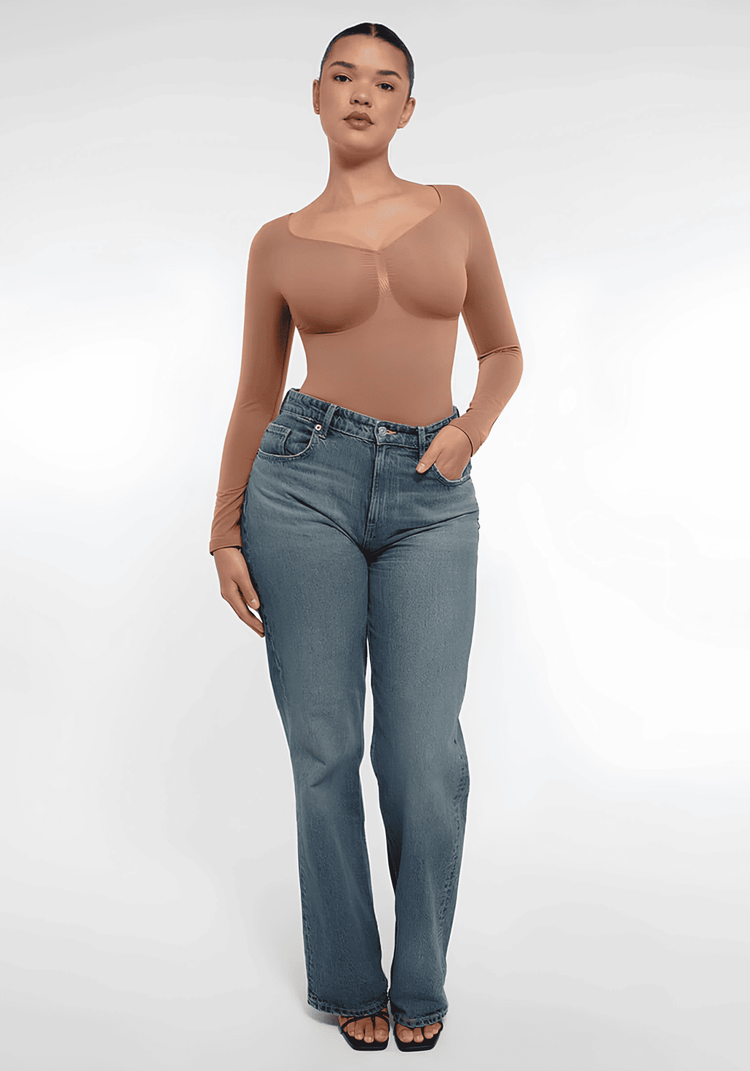 long sleeve sculpting bodysuit with seamless fit and sculpting silhouette, styled with jeans for everyday comfort
