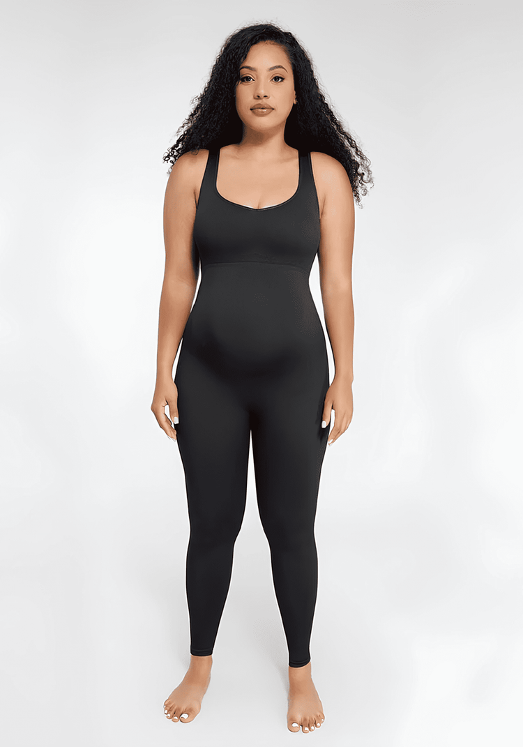 Maternity catsuit in black with square neck, tank straps, built-in shelf bra, and a flattering second-skin fit.