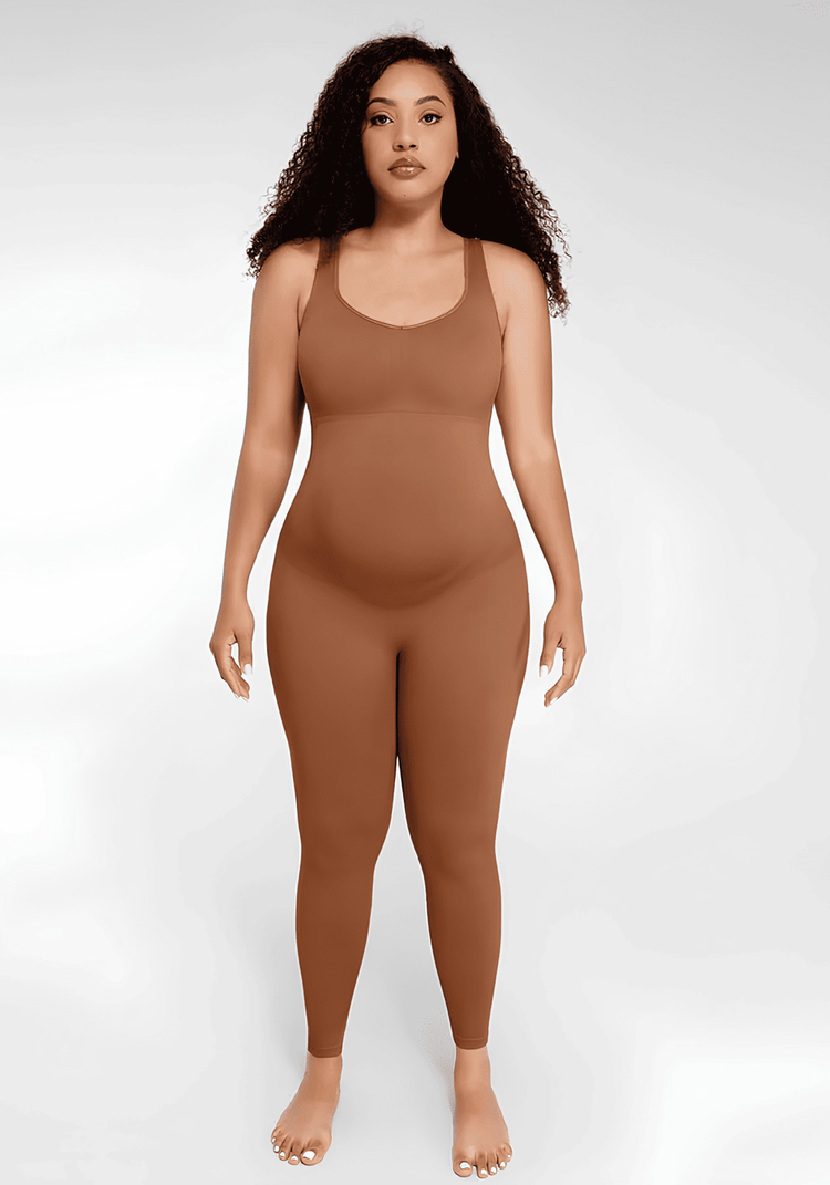 maternity catsuit in brown with scoop neck, tank straps, and second-skin fit for growing bump