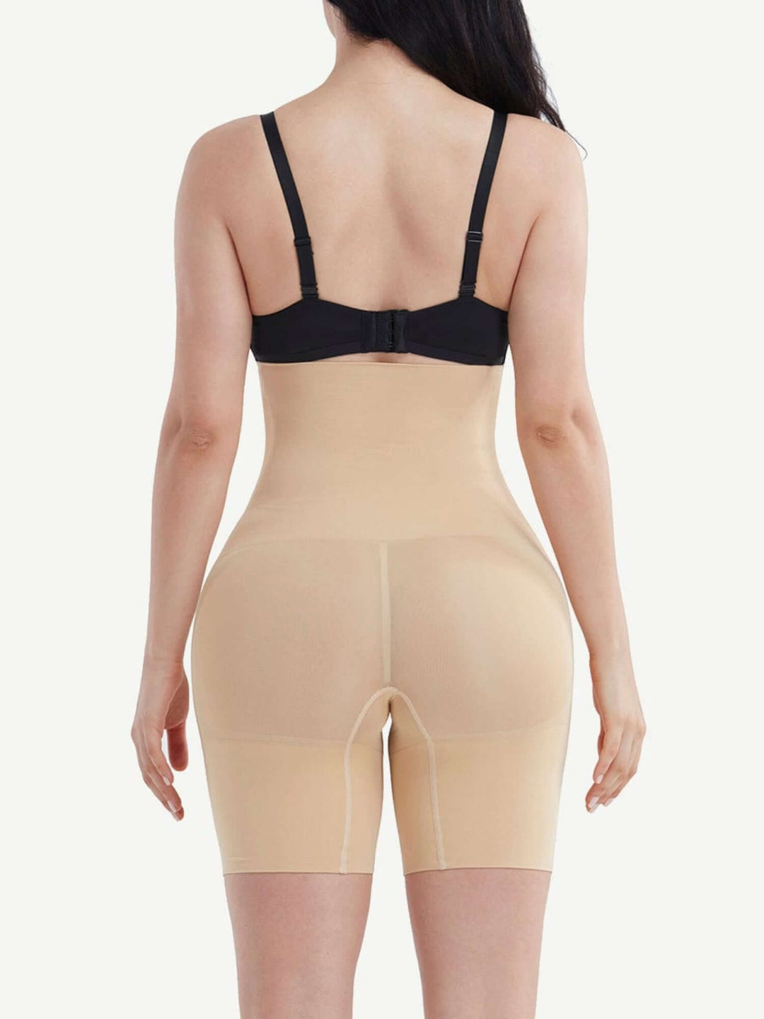 mid-thigh body shaper with tummy control, waist slimming, and lifted back thigh support for a smooth silhouette