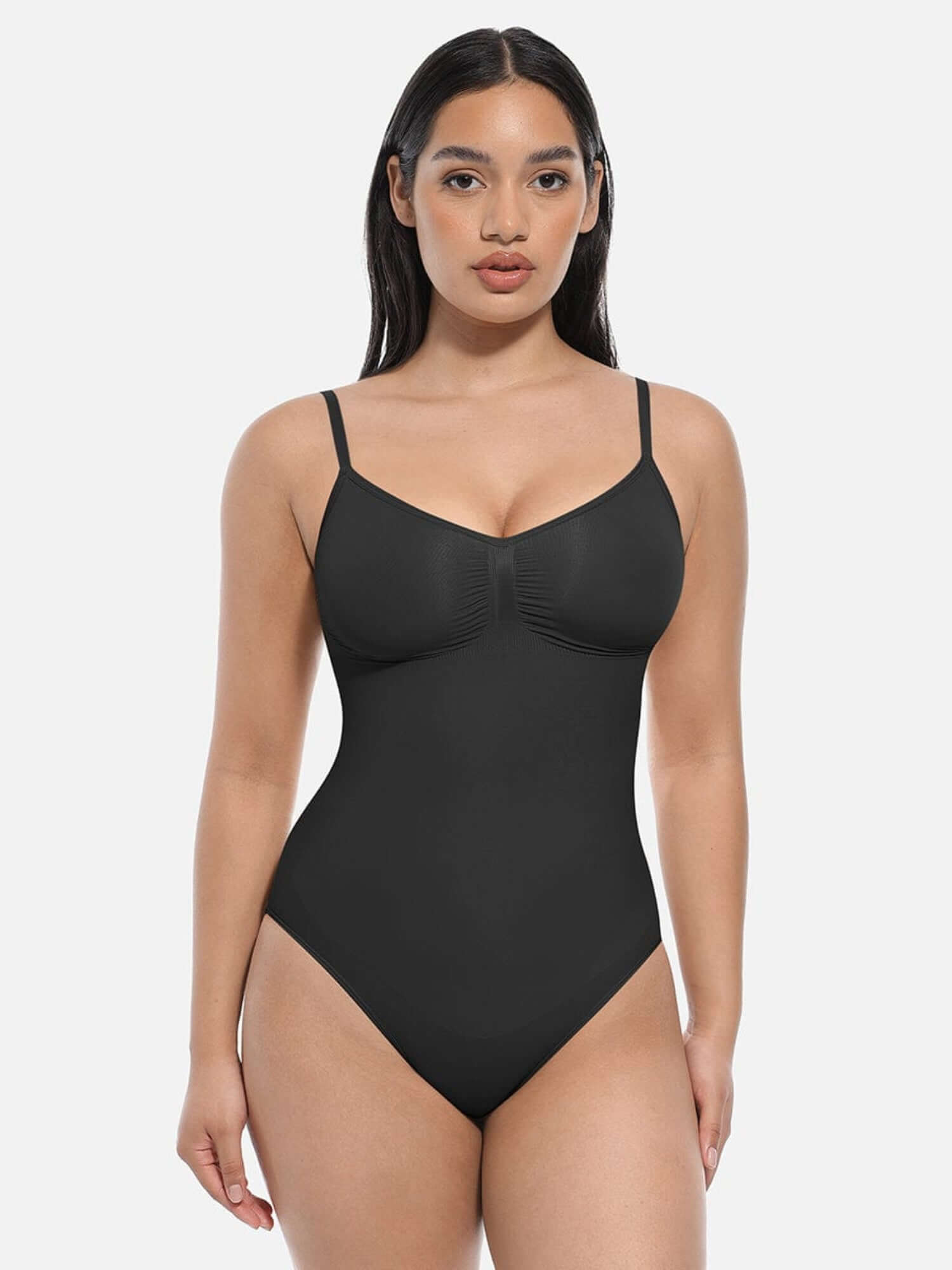 one-piece thong bodysuit in black with adjustable straps, body-shaping support, and sleek thong cut for a chic silhouette