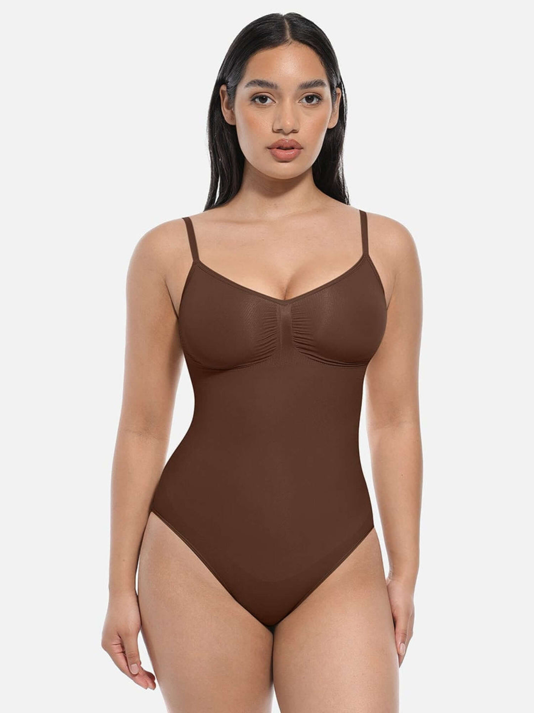 One-piece thong bodysuit with adjustable straps and shaping support for a sleek, chic silhouette.