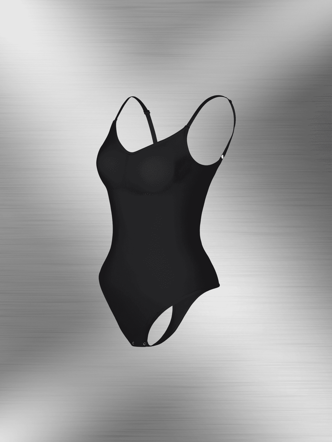 Black open-back bodysuit with adjustable straps, low scoop back, and snap closure for seamless support under clothing.