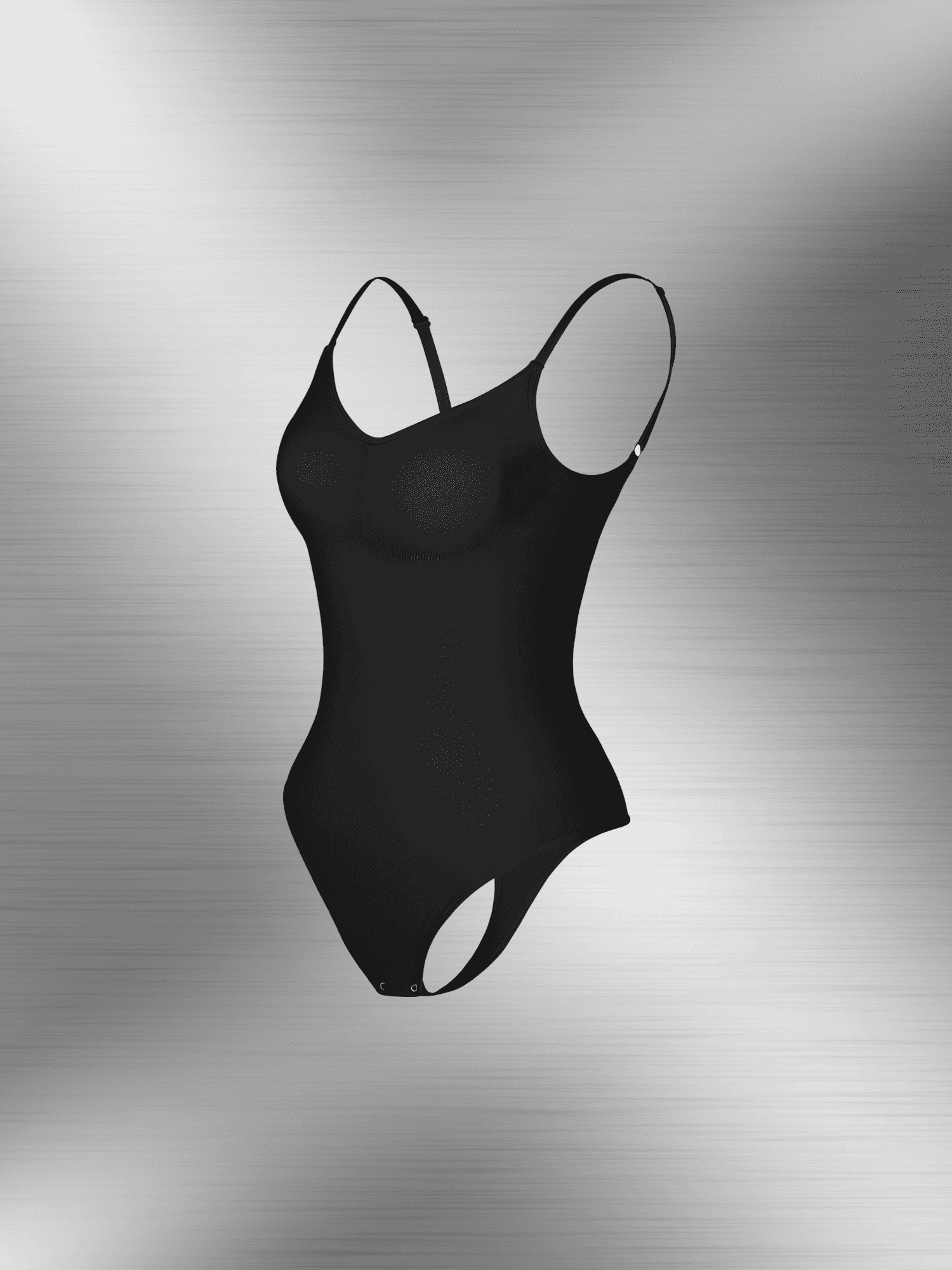 Black open-back bodysuit with adjustable straps, low scoop back, and snap closure for seamless support under clothing.