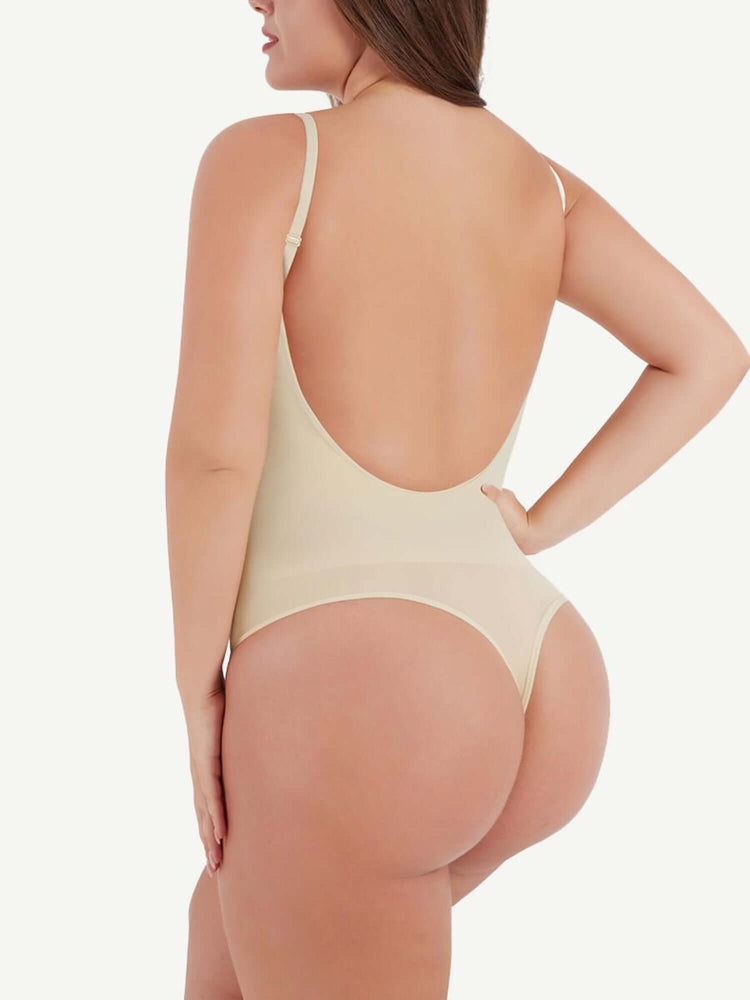 Back view of beige open-back bodysuit with low scoop back and adjustable straps for a smooth, flattering fit