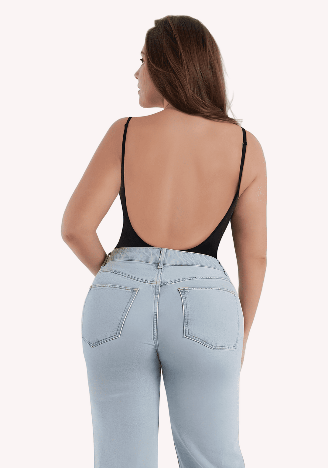 Woman wearing open-back bodysuit with low scoop back for low-back outfits and a smooth flattering fit