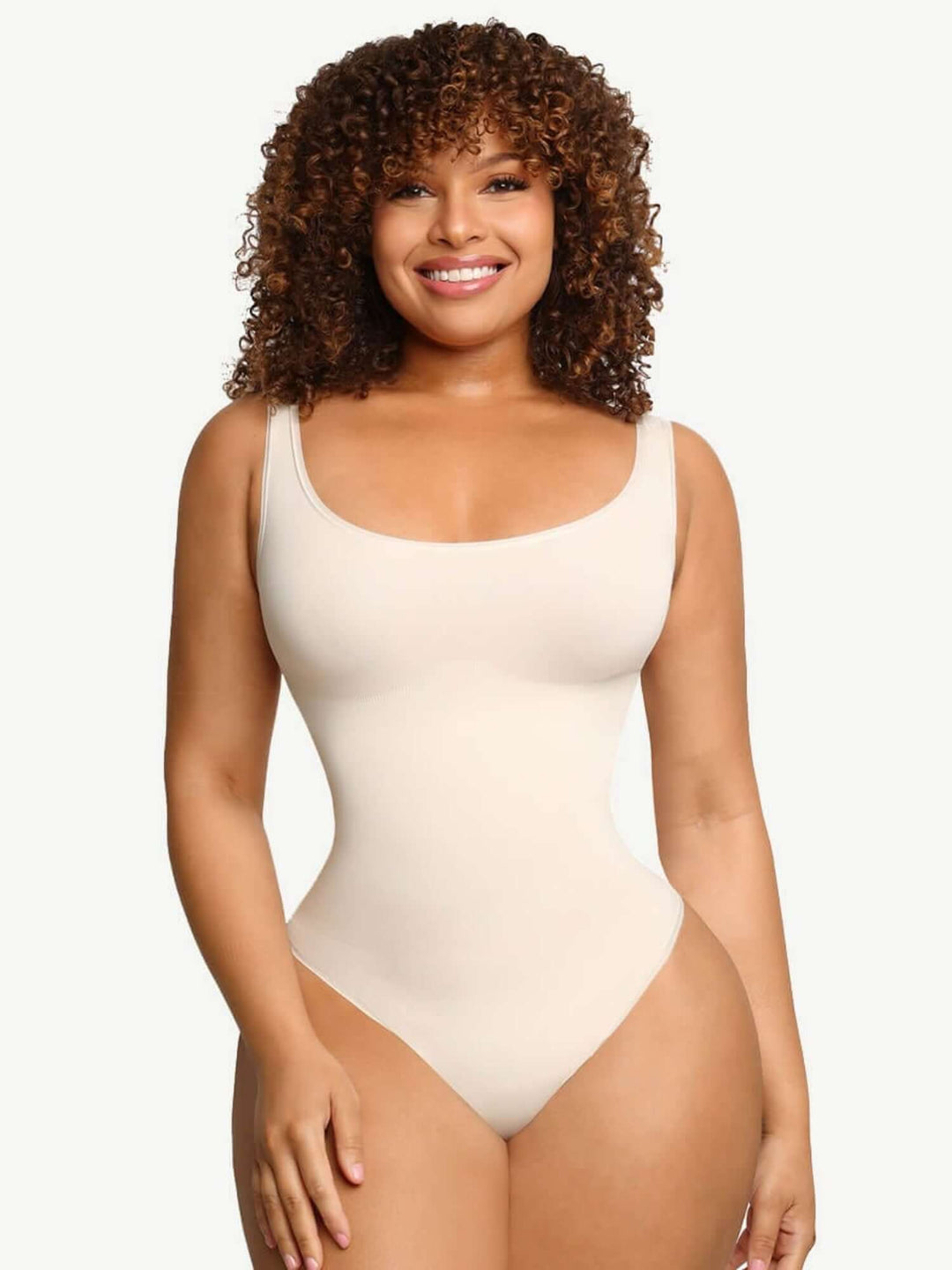 Compression sculpt brief bodysuit with smoothing, curve-enhancing fit and scoop neckline for a streamlined silhouette