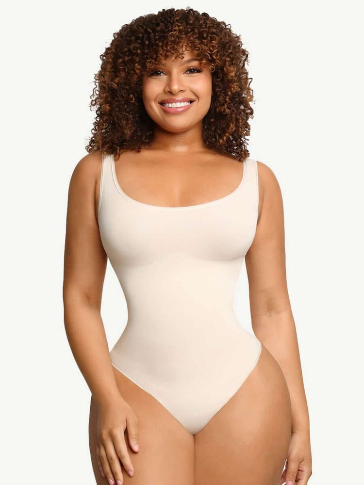 Compression sculpt brief bodysuit with smoothing, curve-enhancing fit and scoop neckline for a streamlined silhouette
