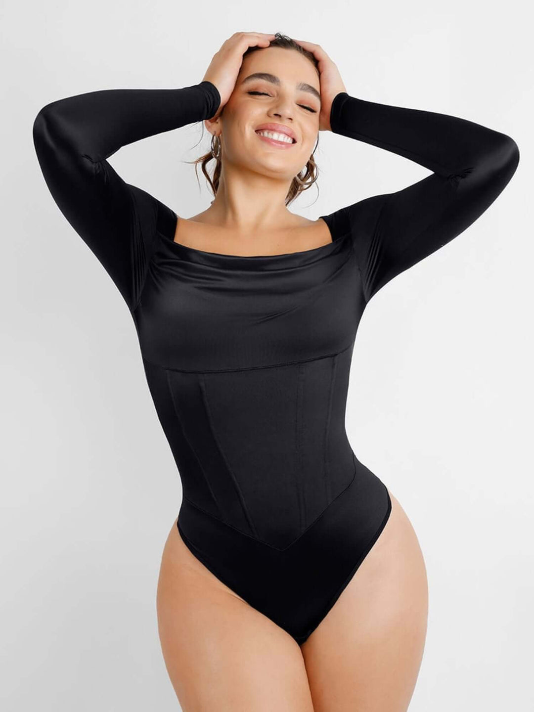 Black corset bodysuit with square neckline and tummy-control shaping for a sleek sculpted fit