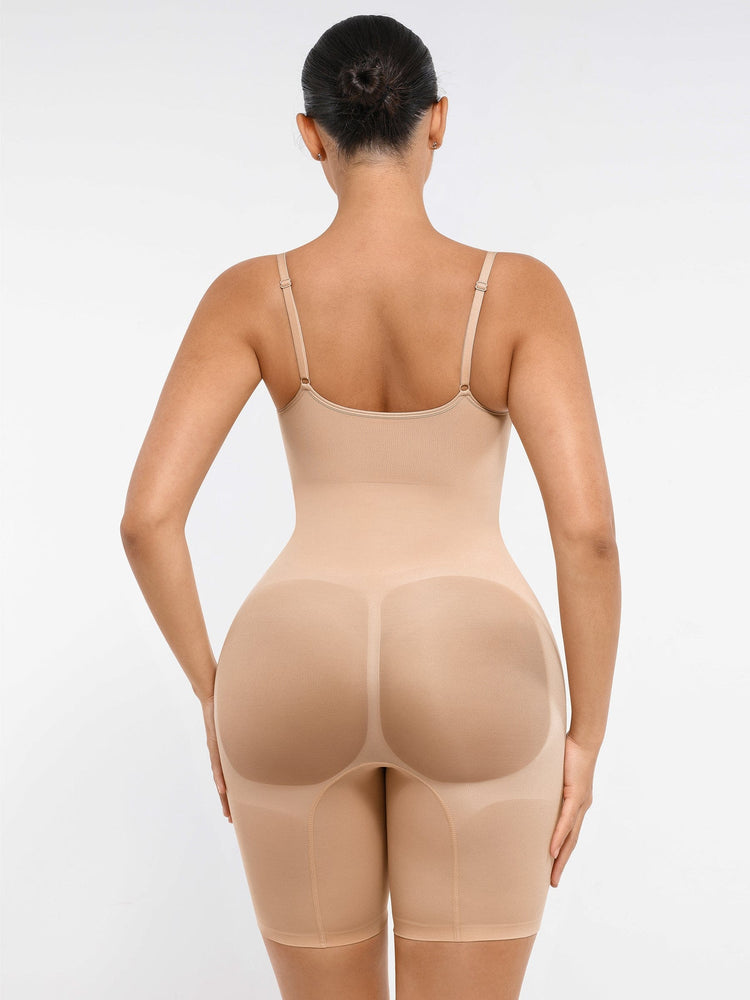 Woman wearing a beige shapewear garment on a white background