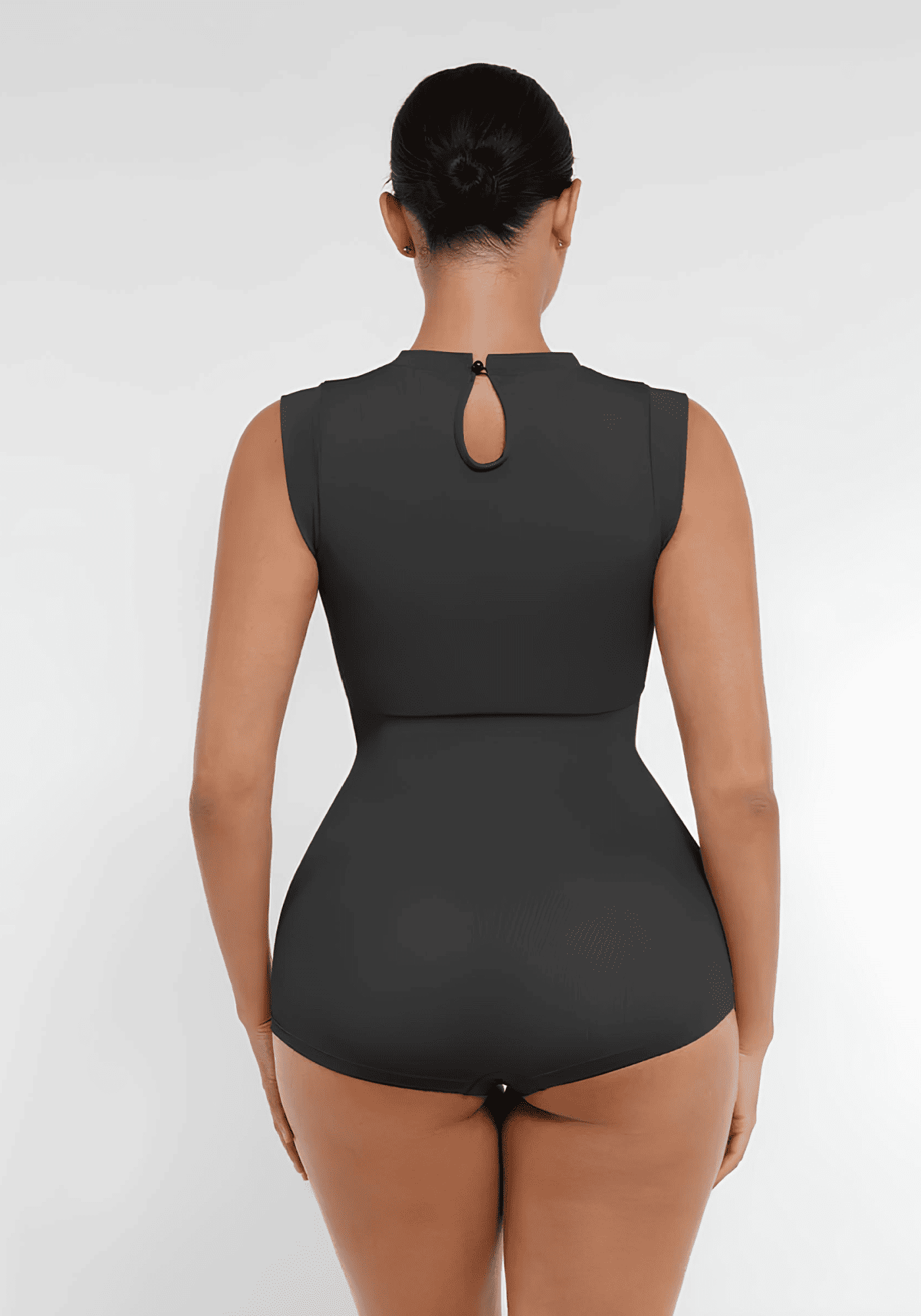 Seamless shaping bodysuit with back keyhole, cap sleeves, and sculpting fit for waist and abdomen support