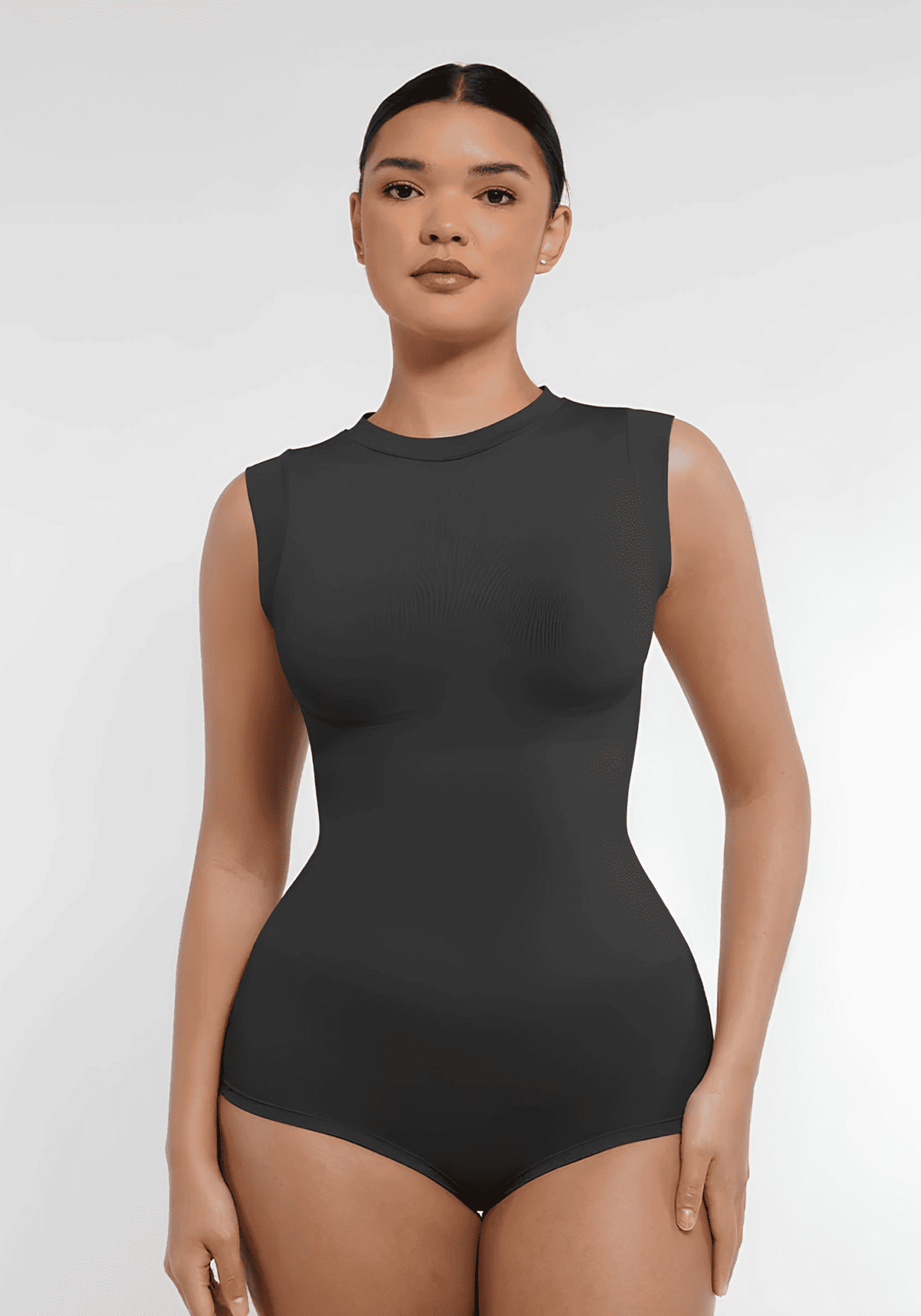 seamless shaping bodysuit with high neck, cap sleeves, and waist-sculpting fit for a sleek silhouette