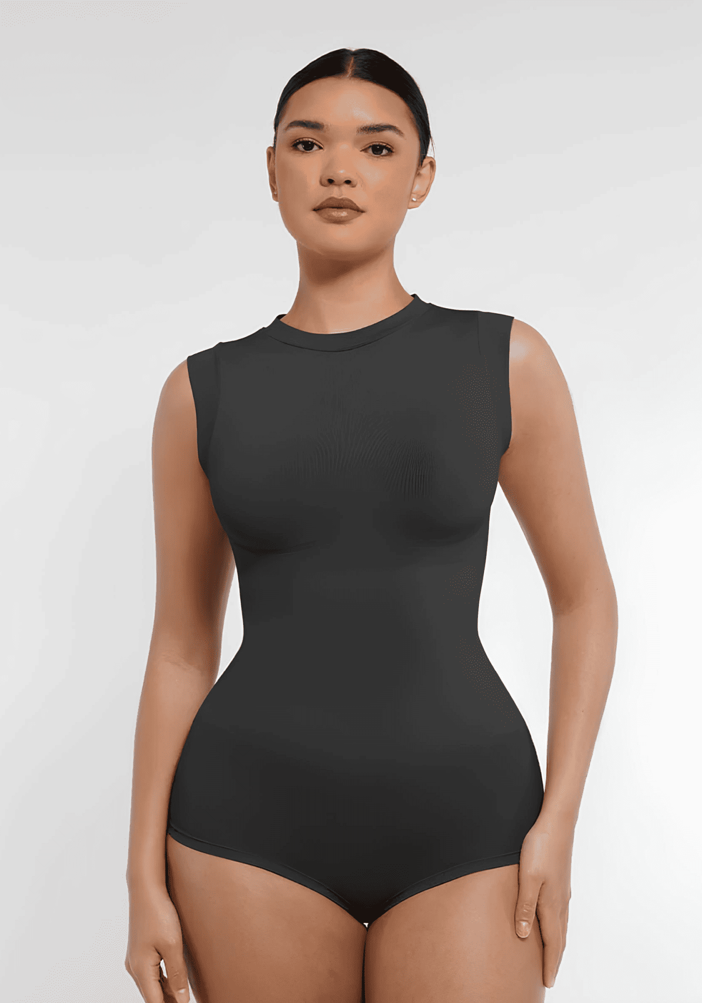 seamless shaping bodysuit with high neck, cap sleeves, and waist-sculpting fit for a sleek silhouette