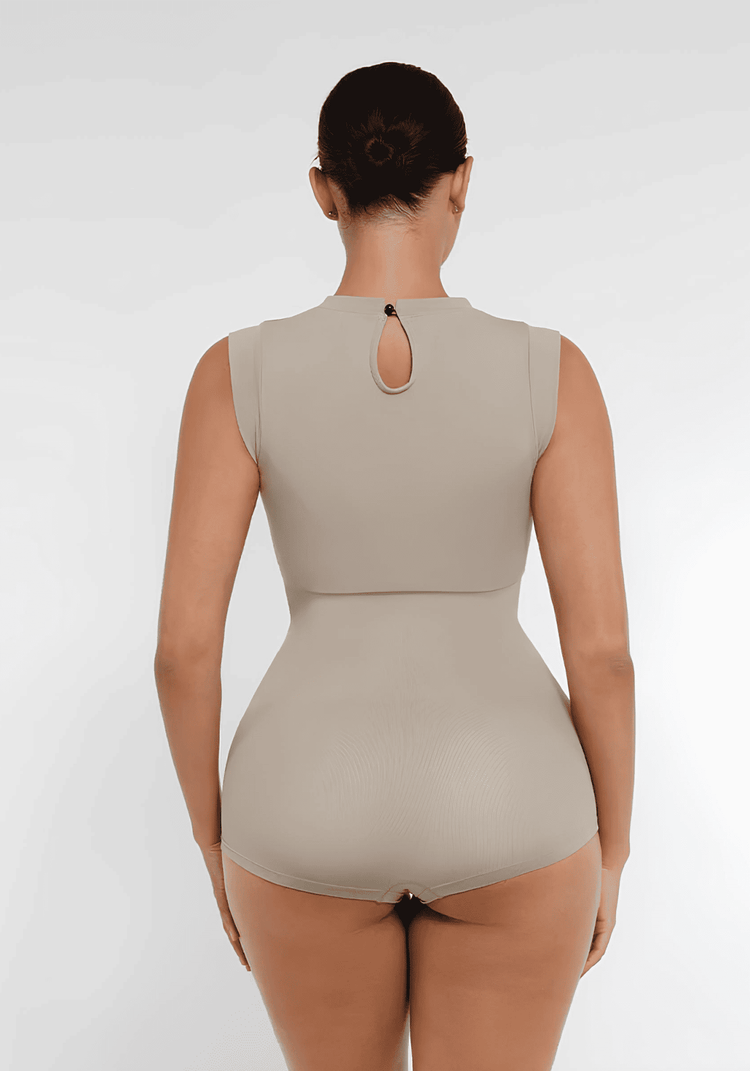 Back view of seamless shaping bodysuit with high neck, cap sleeves, and sculpting waist control for a sleek silhouette