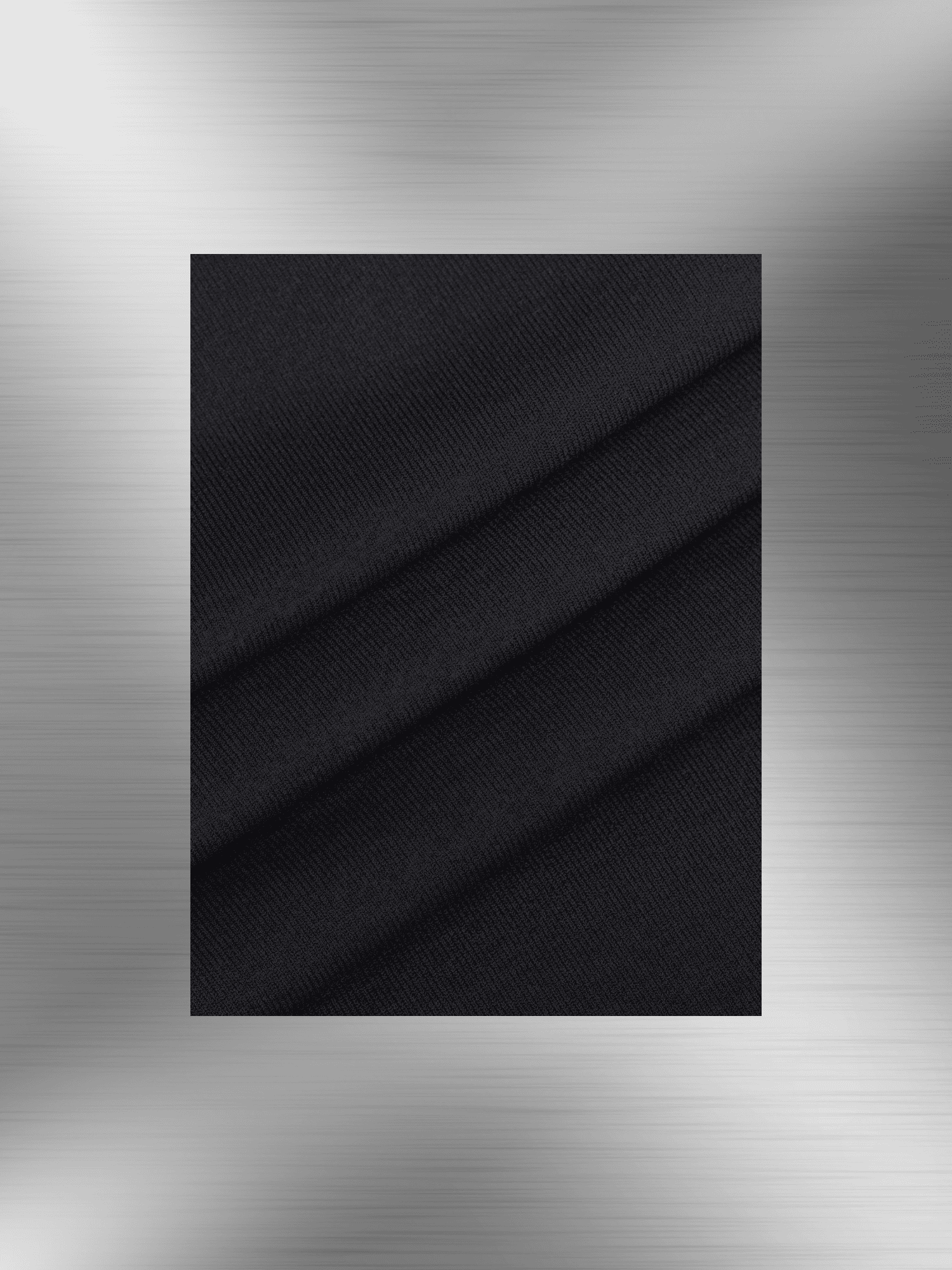 Black textured fabric close-up for shaping dress with bust support, showing soft seamless material and elegant drape.