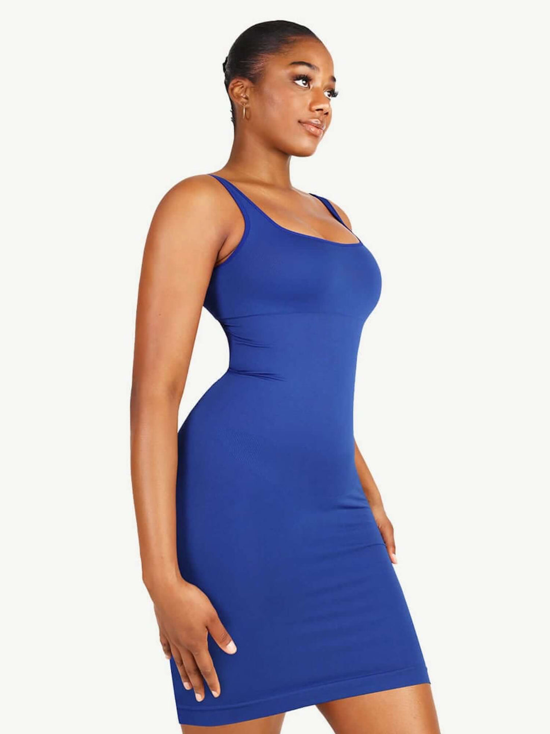 square neck bodycon mini dress in cobalt blue, fitted ribbed stretch fabric, flattering sleeveless silhouette