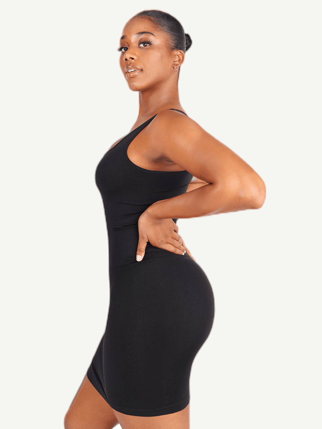 square neck bodycon mini dress in black ribbed fabric, flattering fitted silhouette for polished everyday wear