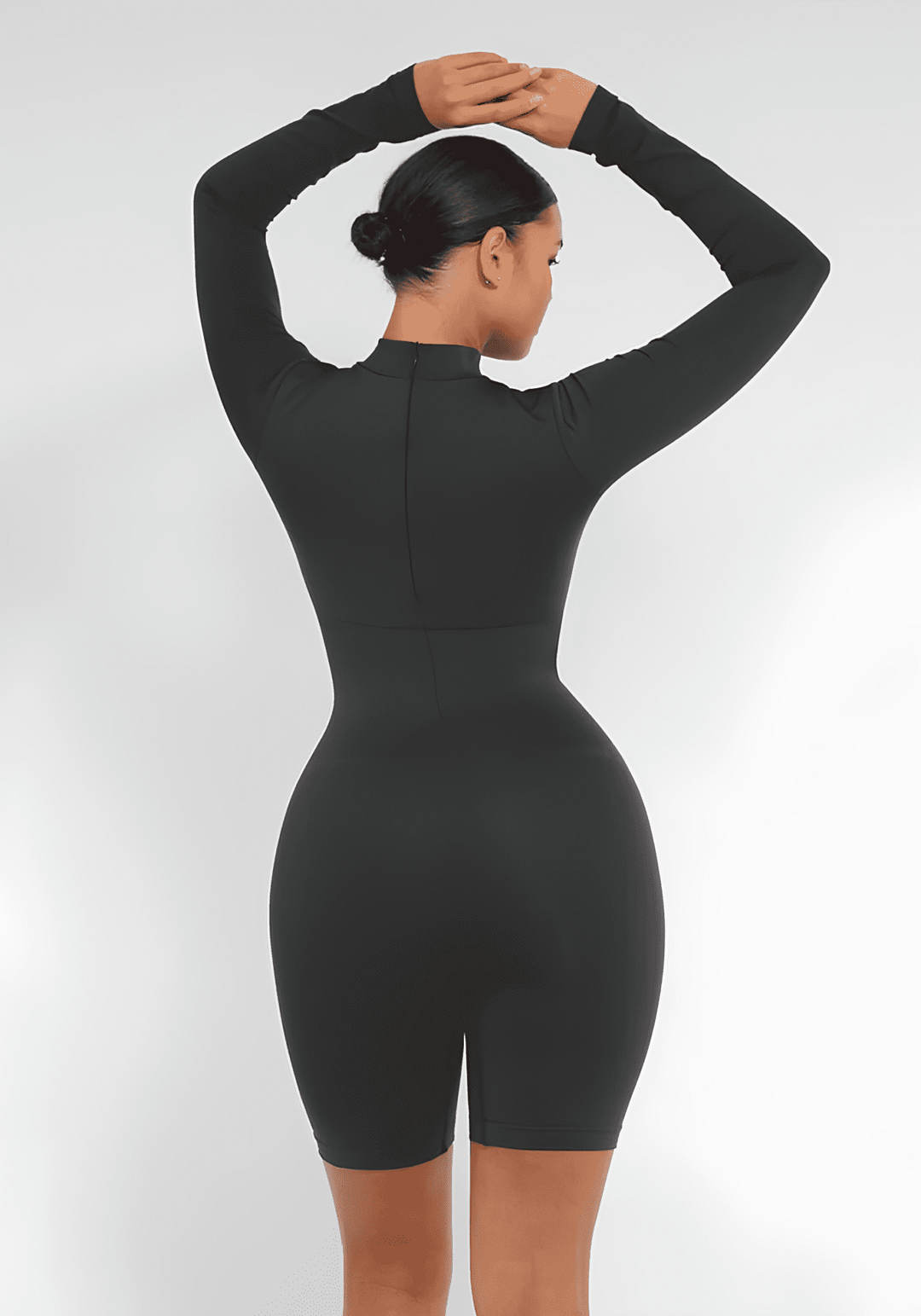 tummy control bust support jumpsuit black seamless back view with sleek fit and invisible zipper