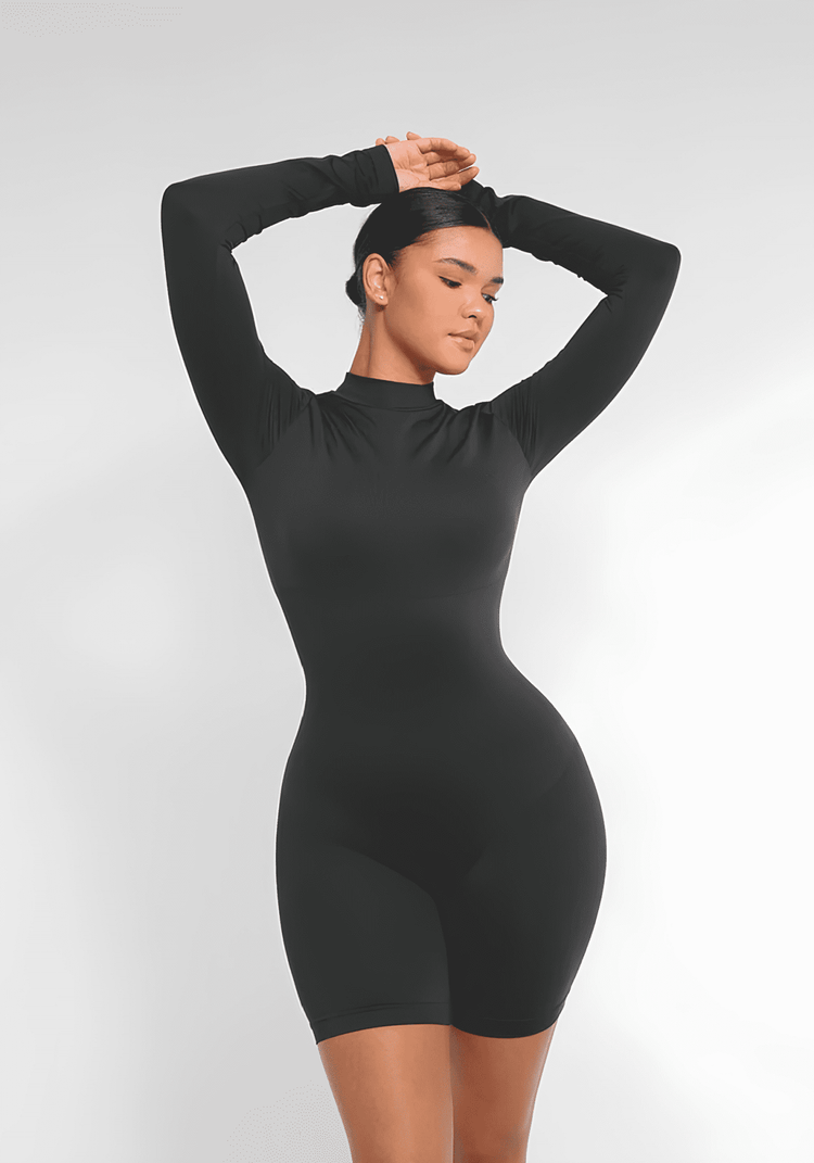 tummy control bust support jumpsuit in black with long sleeves, high neck, and body-hugging fit for sleek shaping