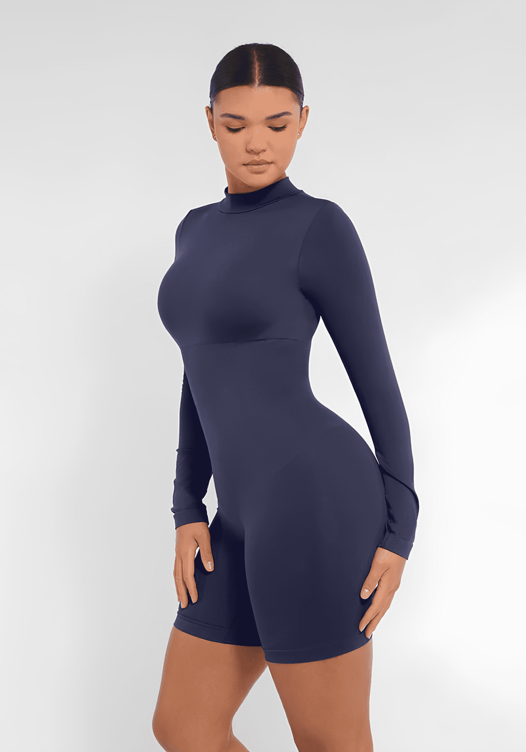tummy control bust support jumpsuit with semi-high collar, seamless fit, and body-hugging shaping for sleek comfort